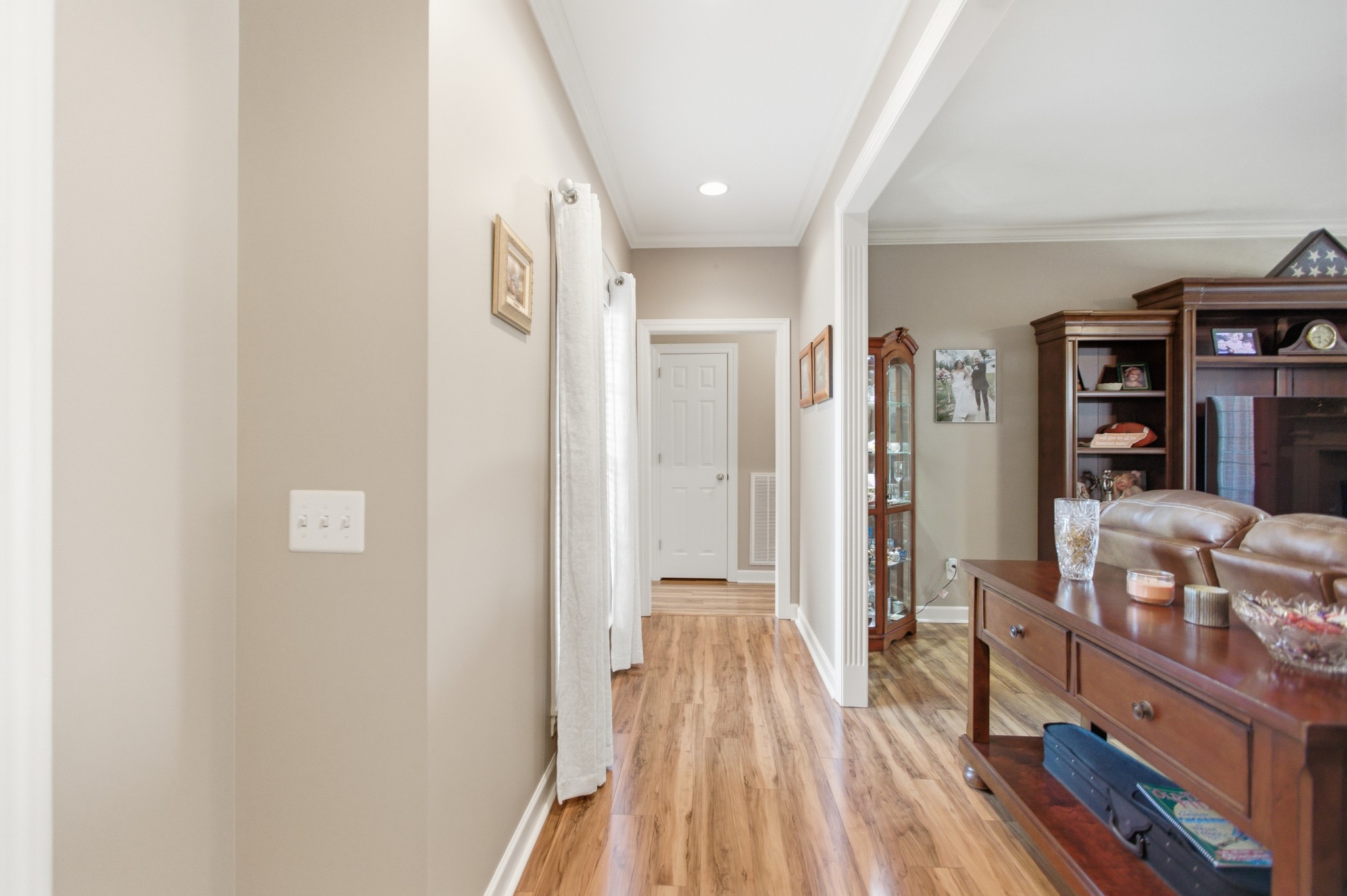 431 Ovoca Lake Road Tullahoma, TN 37388 - Photo 7 of 58 a view of a hallway with wooden floor and furniture