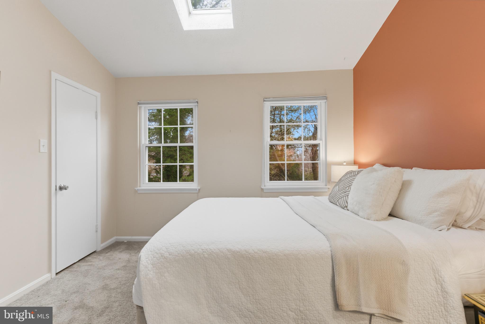 517 Pickwick Village Way Silver Spring, MD 20901 - Photo 17 of 39 a bedroom with a large bed and a window