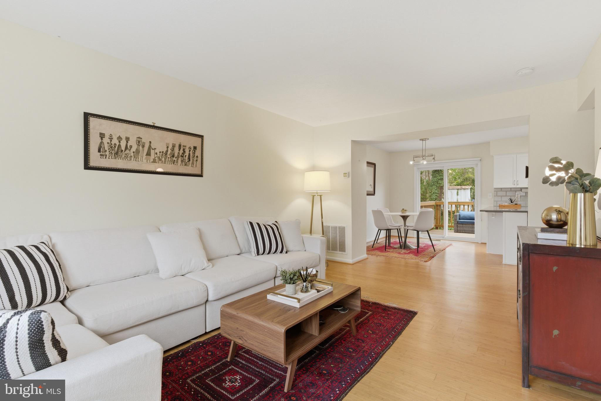 517 Pickwick Village Way Silver Spring, MD 20901 - Photo 2 of 39 a living room with furniture and wooden floor