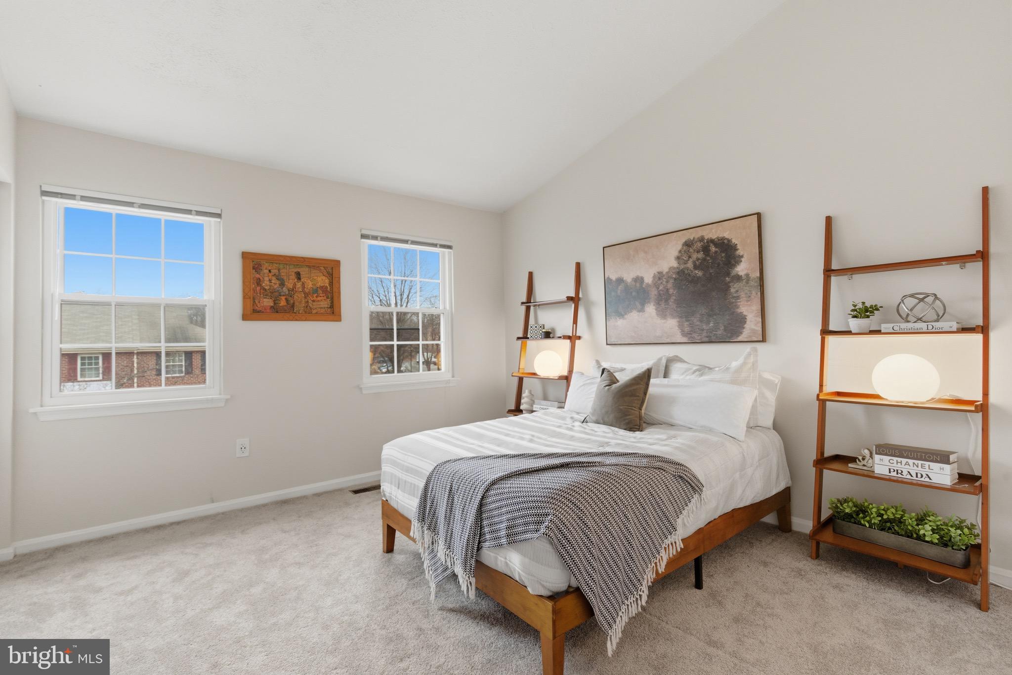 517 Pickwick Village Way Silver Spring, MD 20901 - Photo 21 of 39 a bedroom with a bed and a night stand