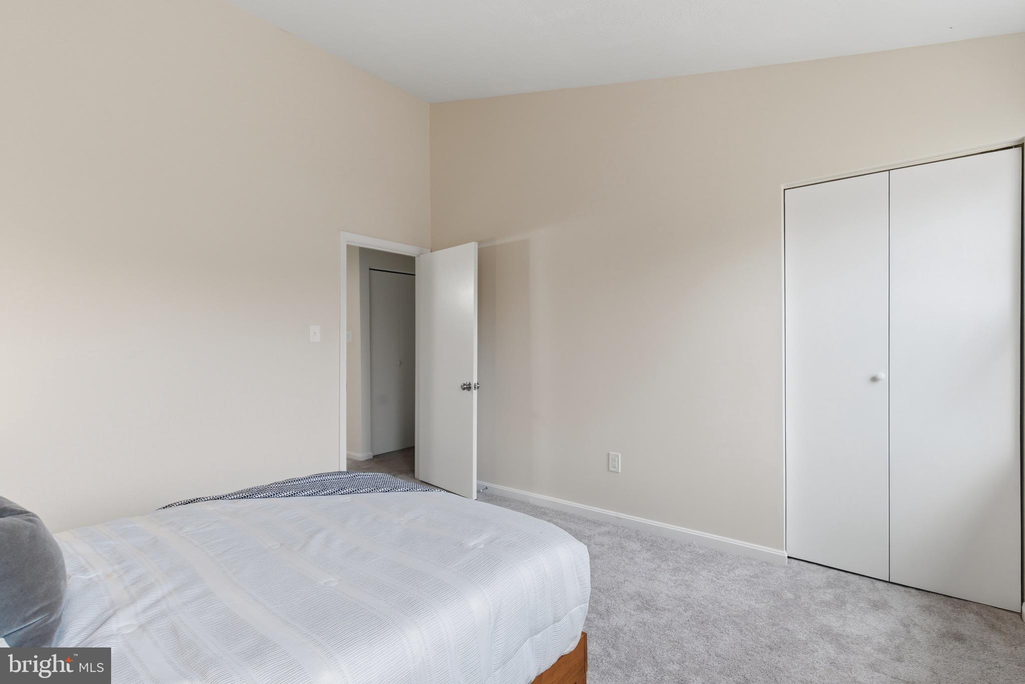 517 Pickwick Village Way Silver Spring, MD 20901 - Photo 24 of 39 a bedroom with a bed and a fan