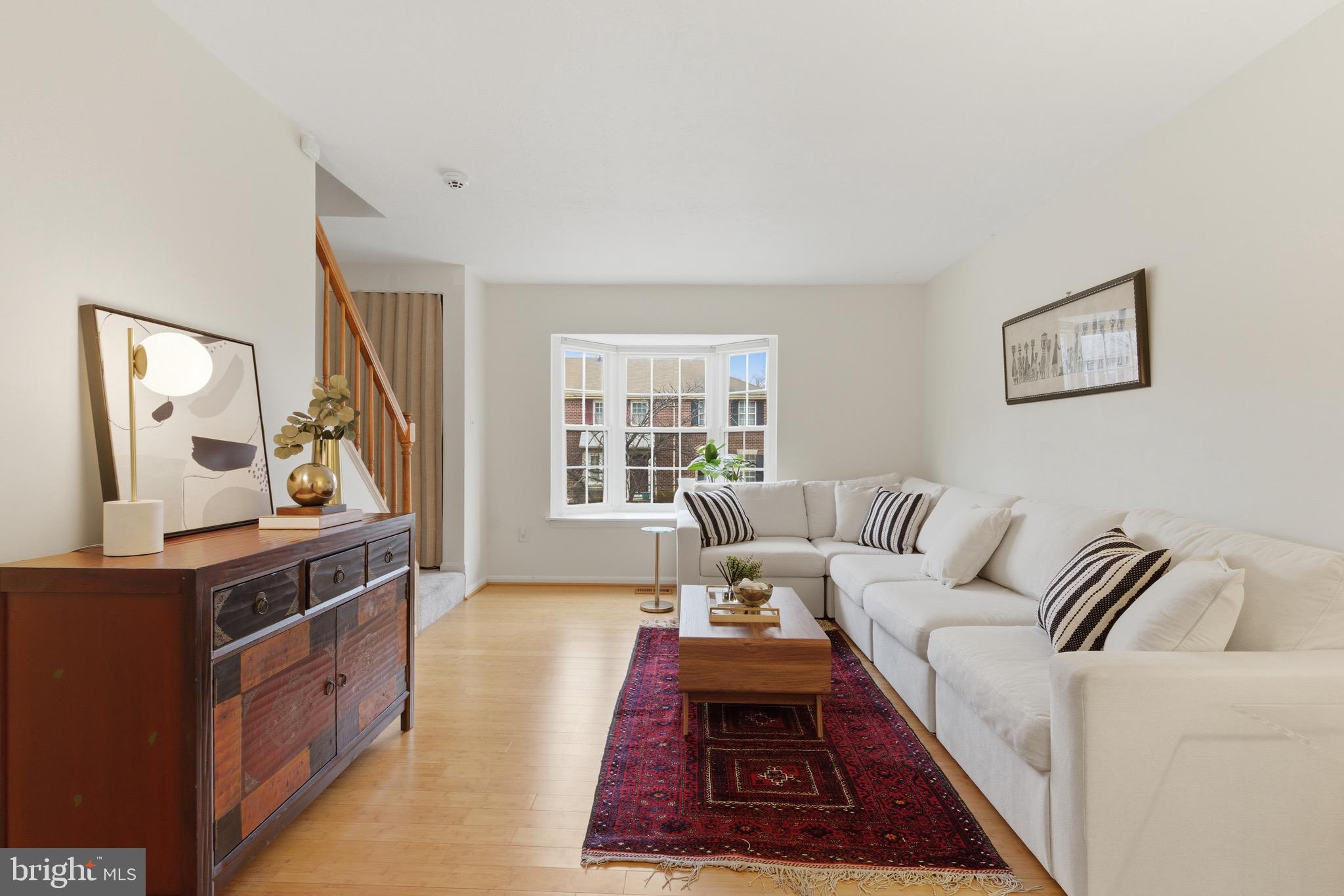 517 Pickwick Village Way Silver Spring, MD 20901 - Photo 3 of 39 a living room with furniture and a window