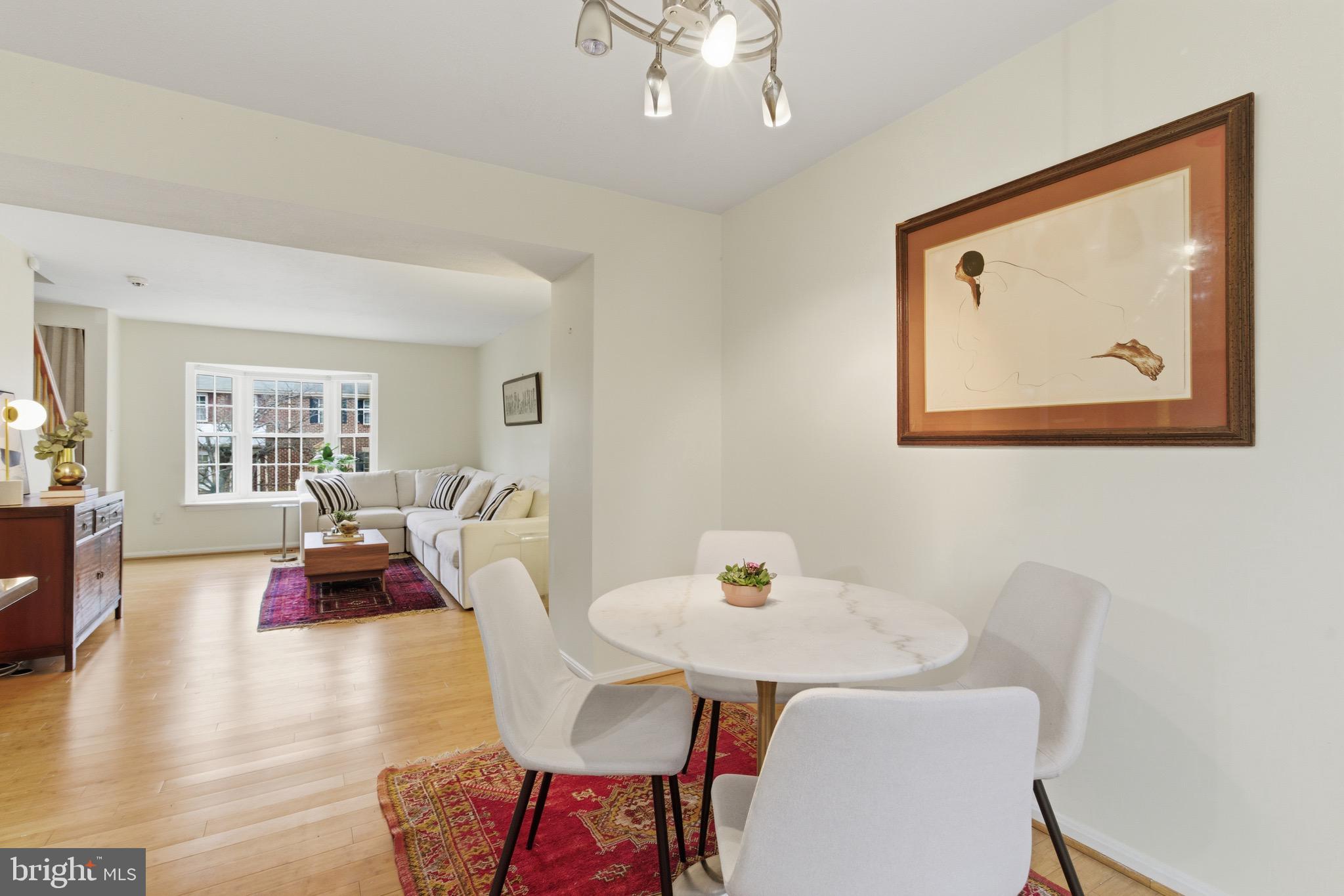517 Pickwick Village Way Silver Spring, MD 20901 - Photo 5 of 39 a living room with furniture and wooden floor