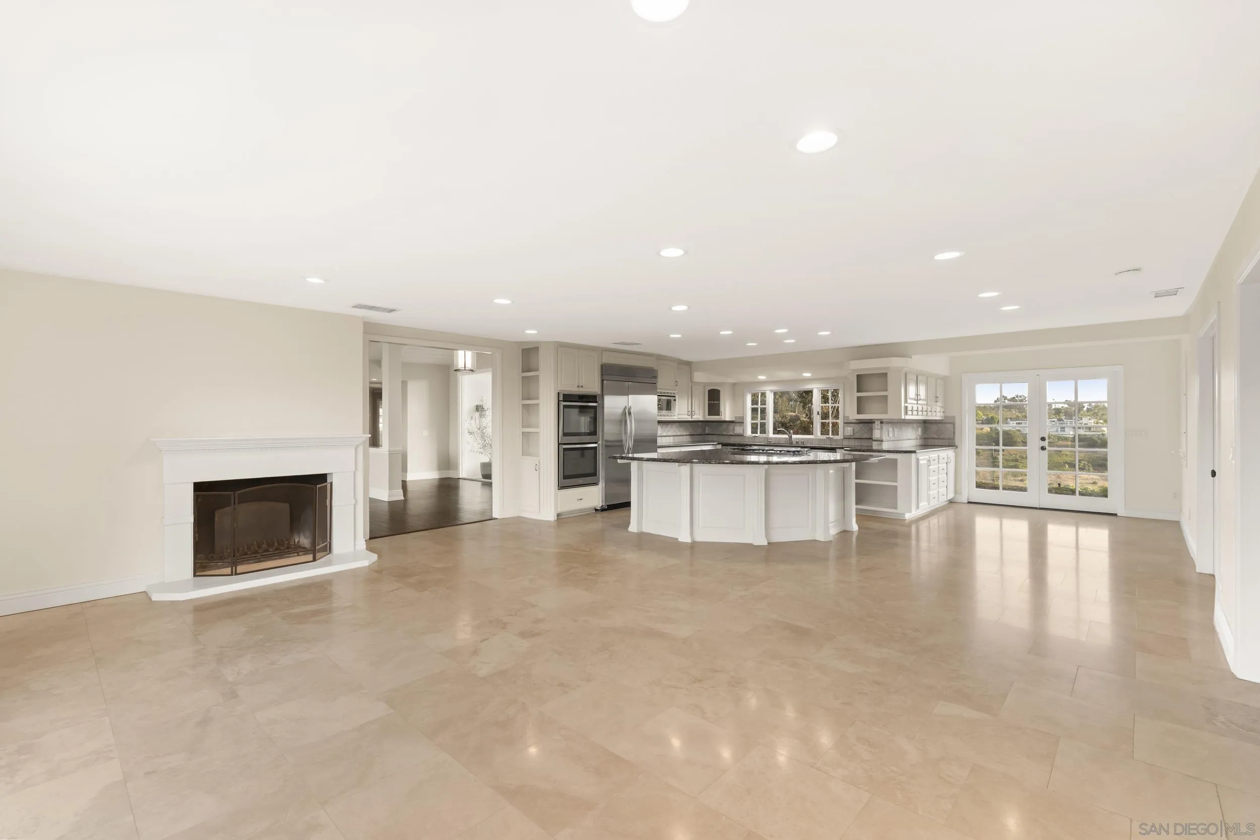 16551 Zumaque Street Rancho Santa Fe, CA 92067 - Photo 11 of 58 Newly painted cabinets, tile flooring, fireplace