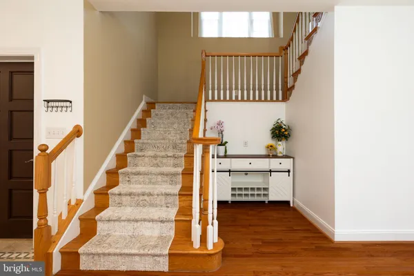 a view of entryway with wooden floor
