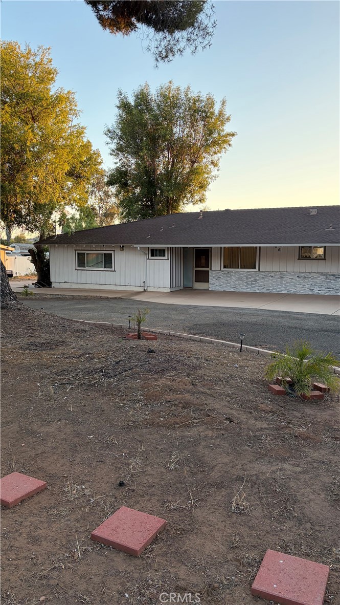 646 El Rancho Drive El Cajon, CA 92019 - Photo 2 of 23 a front view of a house with a yard