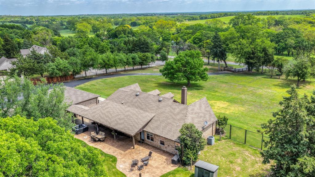 2691 Farm To Market Road 730 North Decatur, TX 76234 - Photo 30 of 36 an aerial view of a house with swimming pool and garden