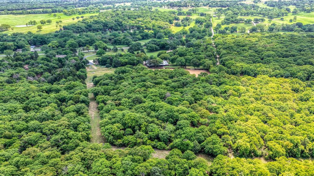 2691 Farm To Market Road 730 North Decatur, TX 76234 - Photo 33 of 36 a view of a forest with a street