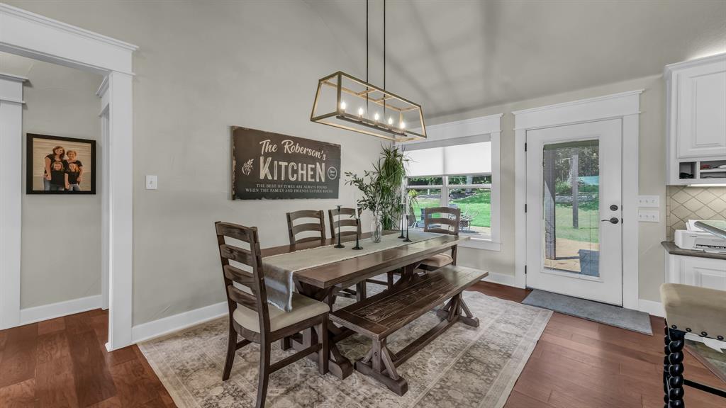 2691 Farm To Market Road 730 North Decatur, TX 76234 - Photo 9 of 36 a view of a dining room with furniture window and wooden floor