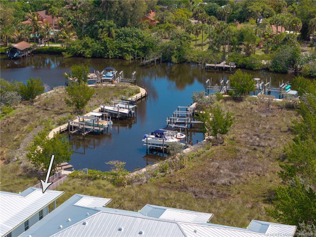 4683 Southeast Manatee Terrace Stuart, FL 34997 - Photo 13 of 45 an aerial view of a house with outdoor space