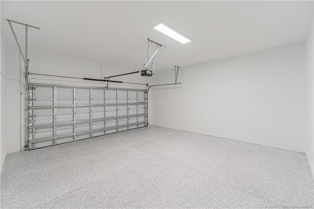 4683 Southeast Manatee Terrace Stuart, FL 34997 - Photo 36 of 45 a view of a garage
