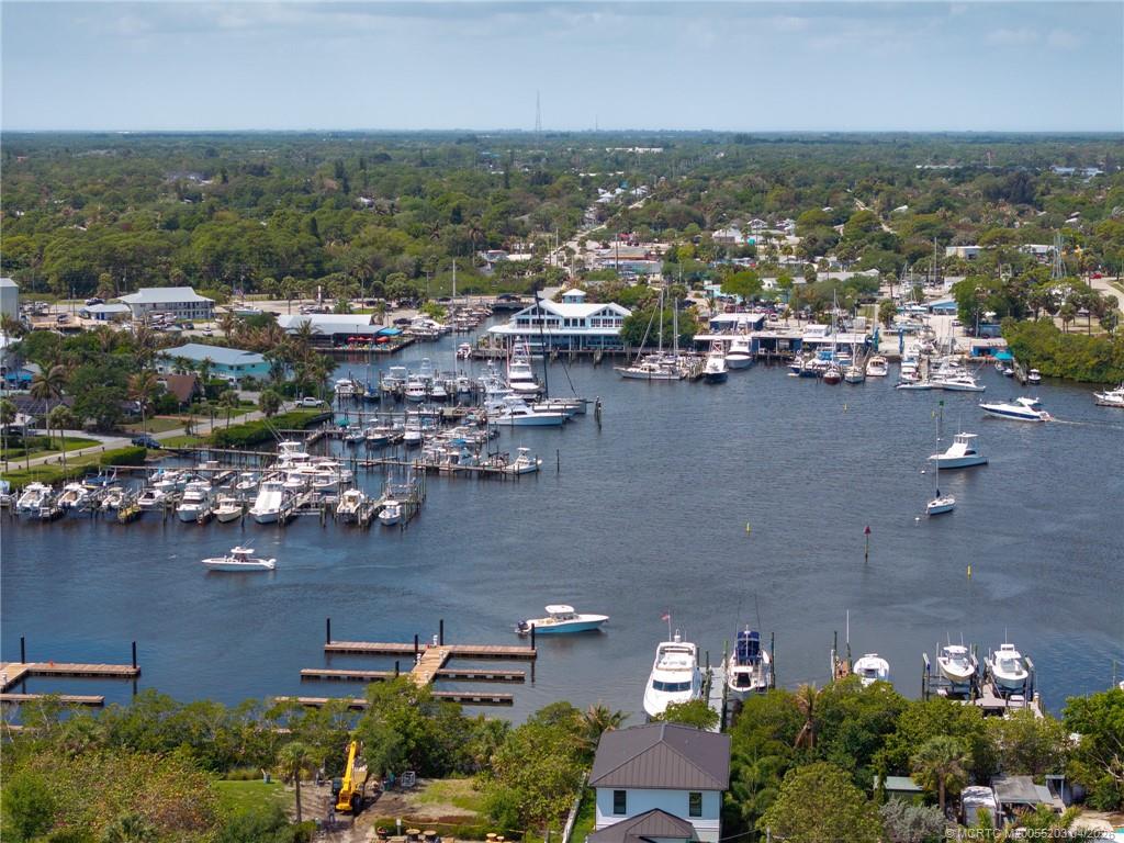 4683 Southeast Manatee Terrace Stuart, FL 34997 - Photo 4 of 45 an aerial view of a city