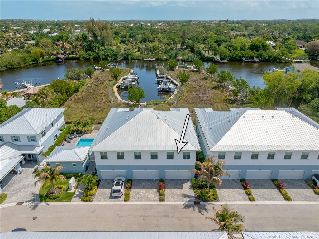 4683 Southeast Manatee Terrace Stuart, FL 34997 - Photo 45 of 45 an aerial view of a house with lake view