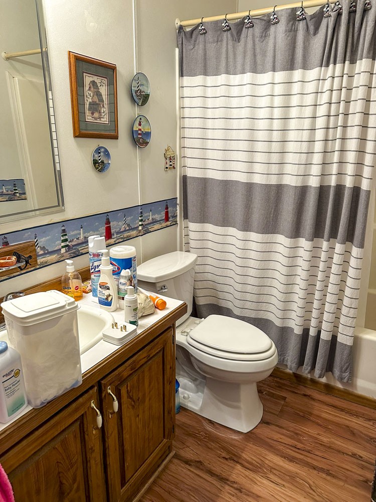 2641 Stanley Valley Road Surgoinsville, TN 37873 - Photo 19 of 26 a bathroom with a sink and a toilet
