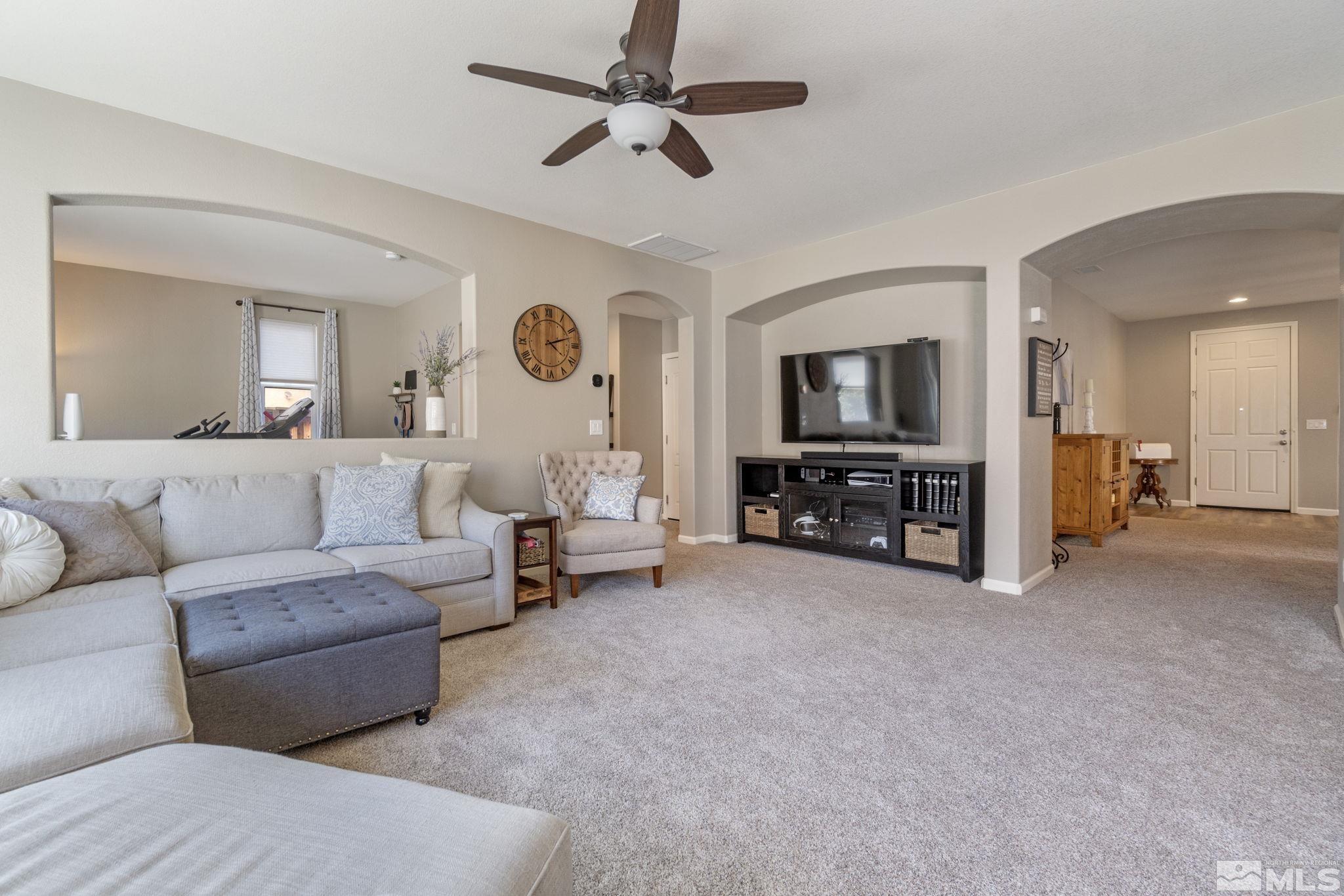 420 Stradella Court Reno, NV 89521 - Photo 14 of 40 a living room with furniture and a flat screen tv