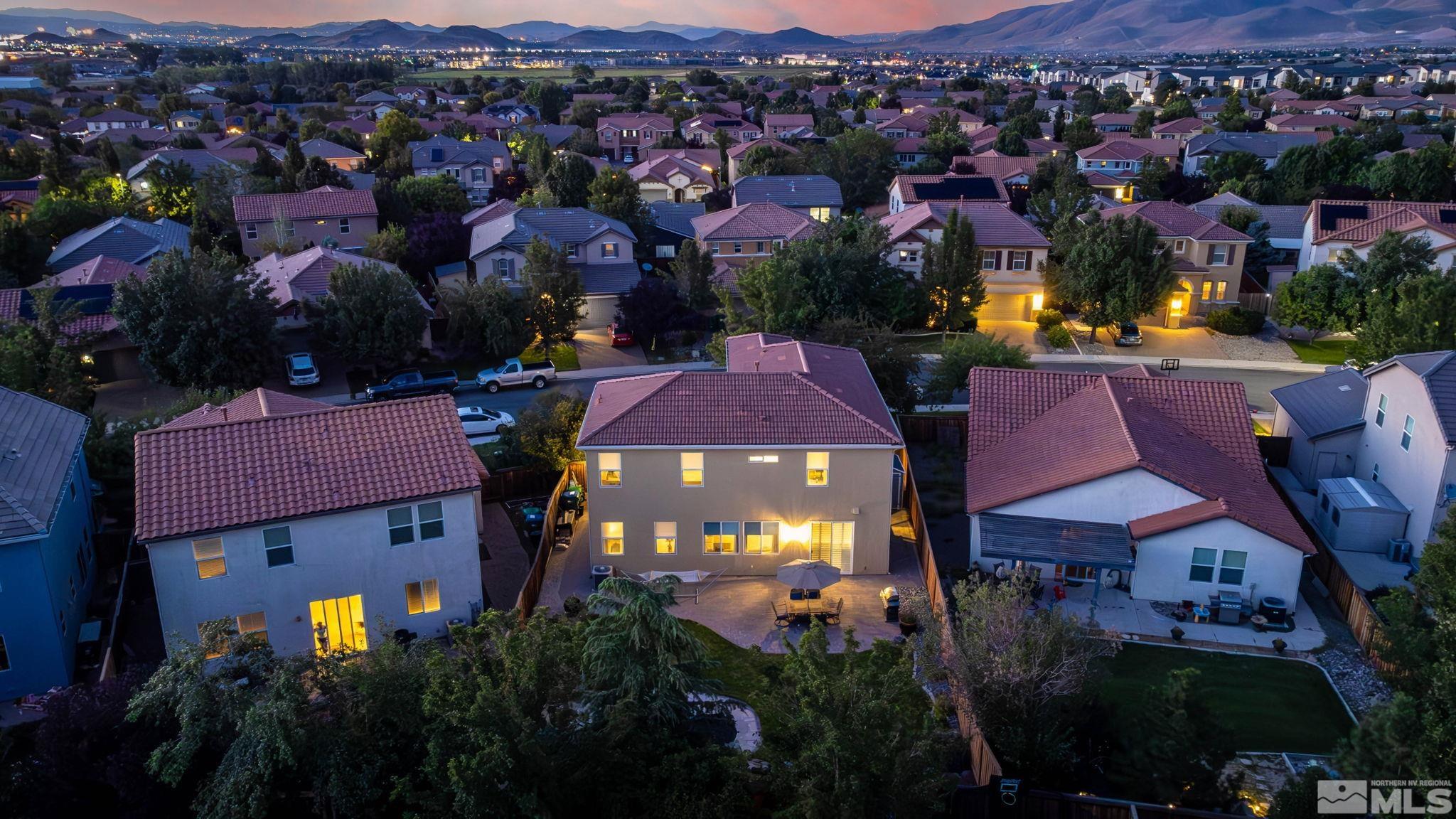 420 Stradella Court Reno, NV 89521 - Photo 4 of 40 an aerial view of residential houses with outdoor space and trees