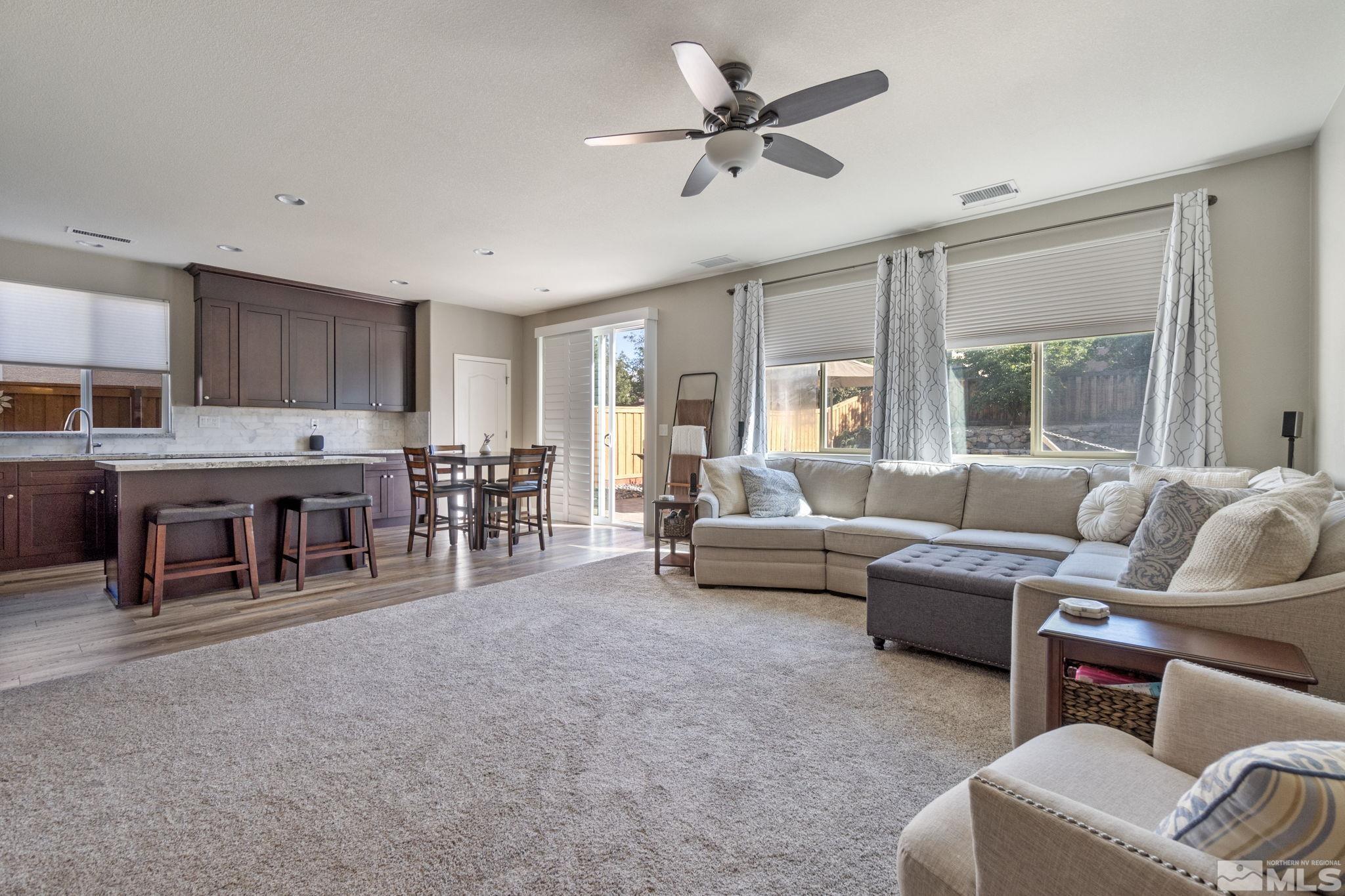 420 Stradella Court Reno, NV 89521 - Photo 9 of 40 a living room with furniture and kitchen view