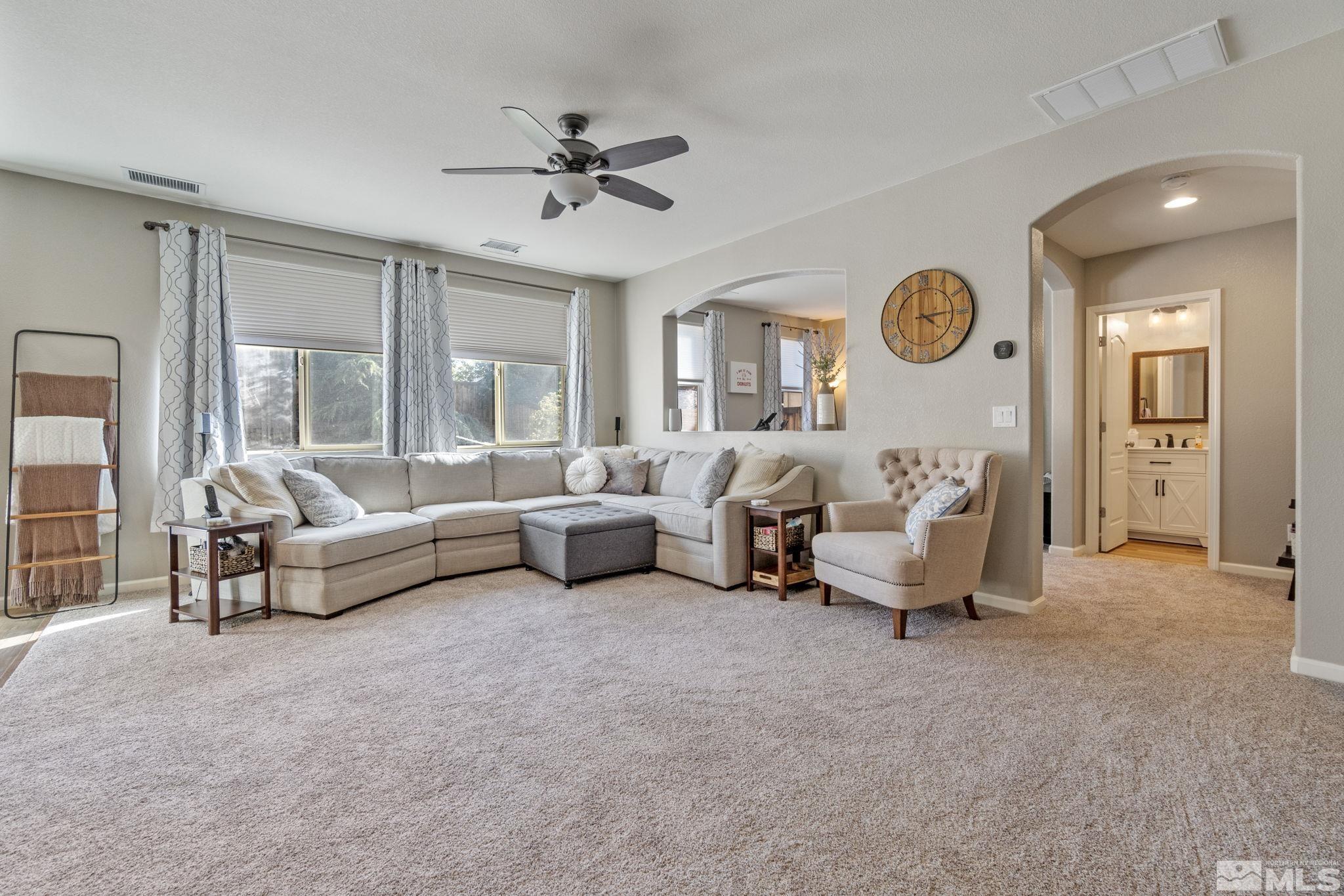 420 Stradella Court Reno, NV 89521 - Photo 10 of 40 a living room with furniture and a large window