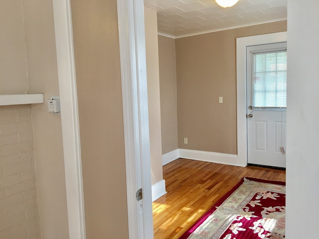 11 Bushwick Place Springfield, MA 01109 - Photo 5 of 13 a view of room with window and wooden floor