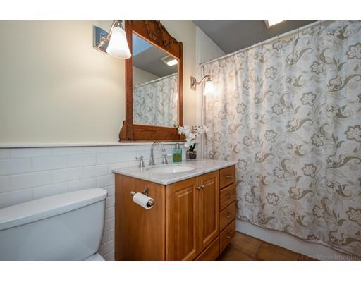 31 Taft Road Sterling, MA 01564 - Photo 12 of 23 a bathroom with a sink and a mirror