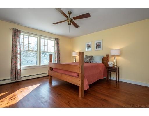 31 Taft Road Sterling, MA 01564 - Photo 13 of 23 a bedroom with a bed and wooden floor