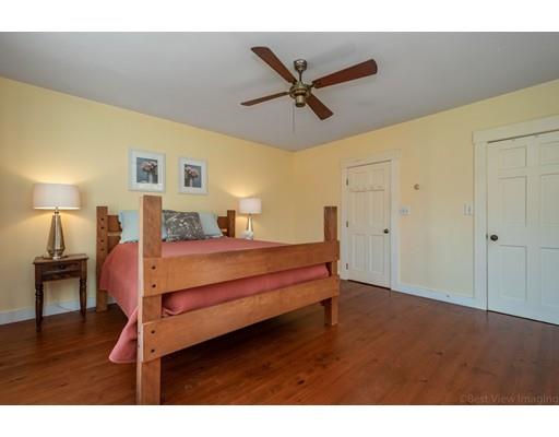 31 Taft Road Sterling, MA 01564 - Photo 14 of 23 a bedroom with a bed and wooden floor