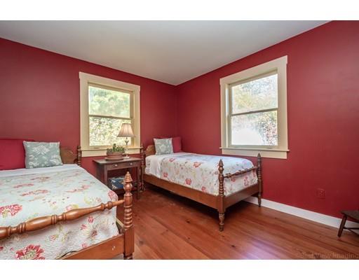 31 Taft Road Sterling, MA 01564 - Photo 15 of 23 a bedroom with a bed window and wooden floor