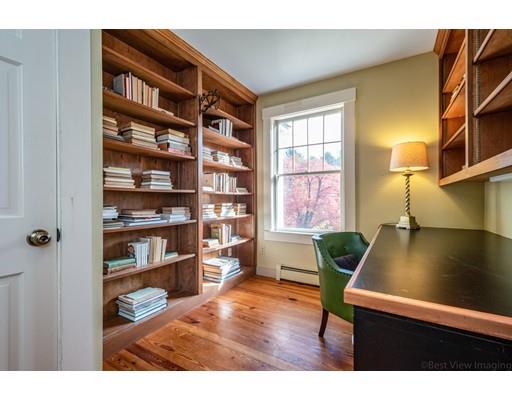 31 Taft Road Sterling, MA 01564 - Photo 17 of 23 a living room with furniture and a book shelf