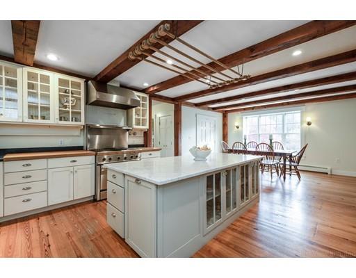 31 Taft Road Sterling, MA 01564 - Photo 8 of 23 a kitchen with a sink and stove top oven
