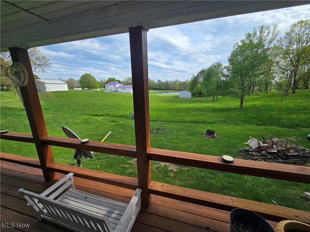 26566 Tri County Fairground Road Freeport, OH 43973 - Photo 19 of 21 Wooden deck featuring a lawn