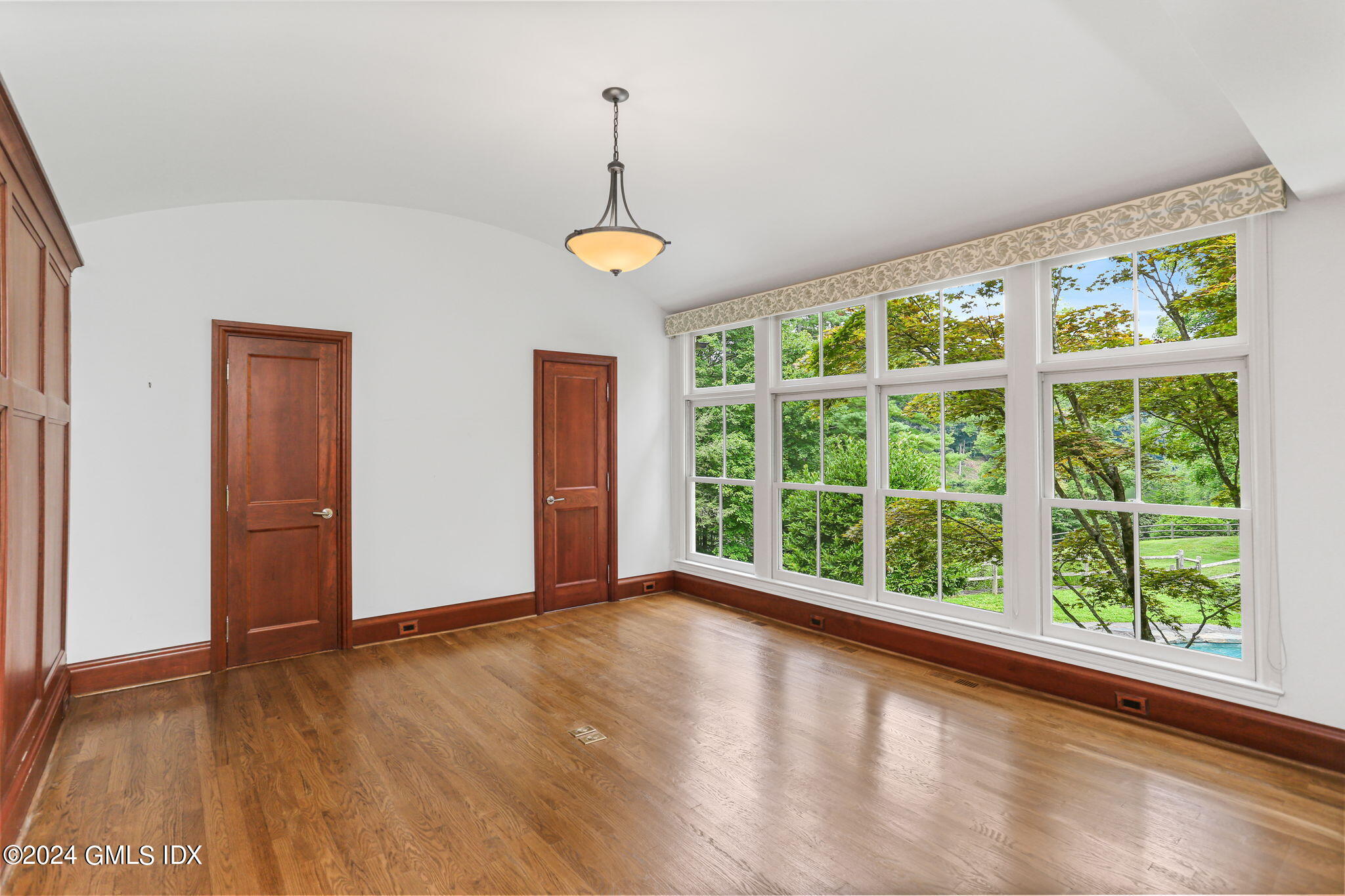 306 Stanwich Road Greenwich, CT 06830 - Photo 64 of 87 a view of room with window and wooden floor