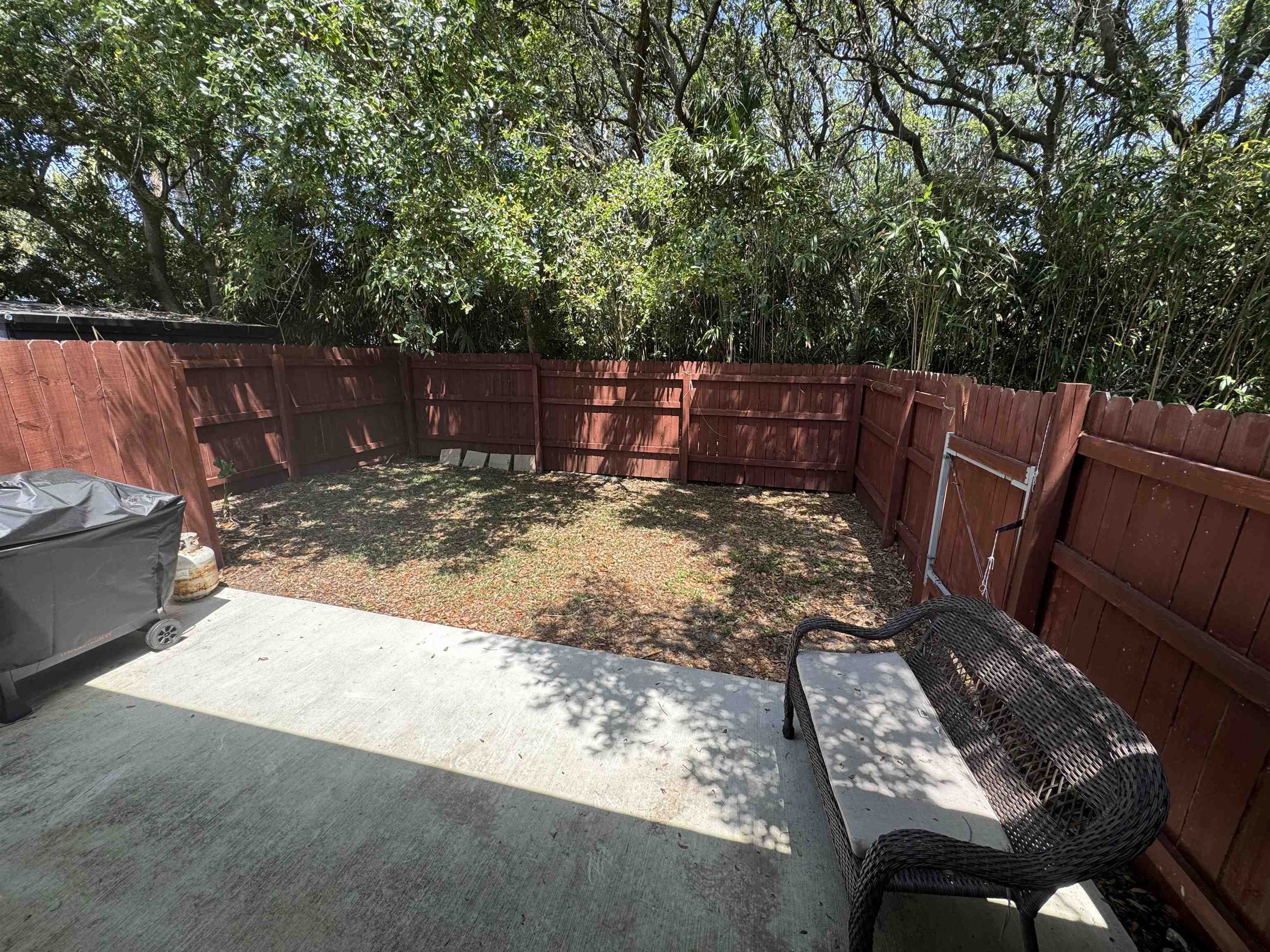202 E Street, Unit A St. Augustine, FL 32080 - Photo 17 of 22 a view of a backyard with sitting area