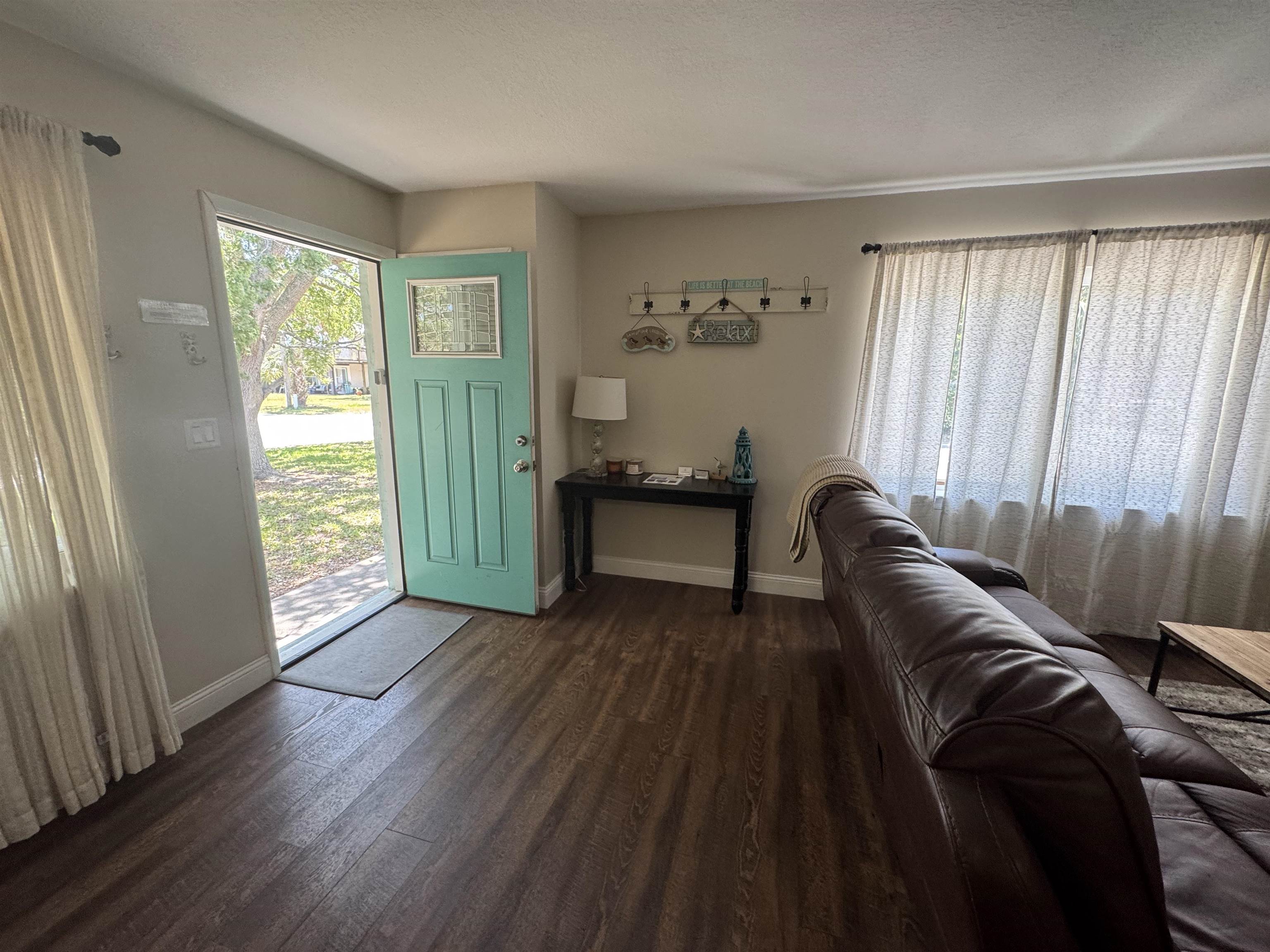 202 E Street, Unit A St. Augustine, FL 32080 - Photo 7 of 22 a living room with furniture and a window