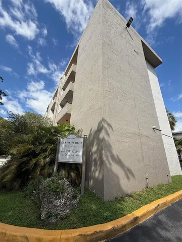 a bathroom with a sink toilet and vanity