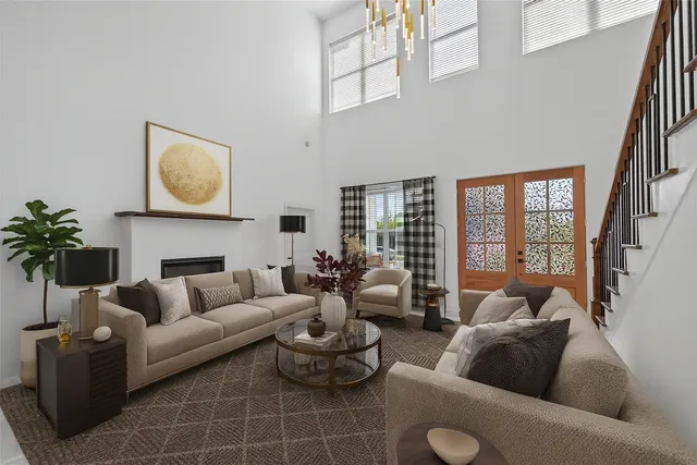 a kitchen with a cabinets and chandelier