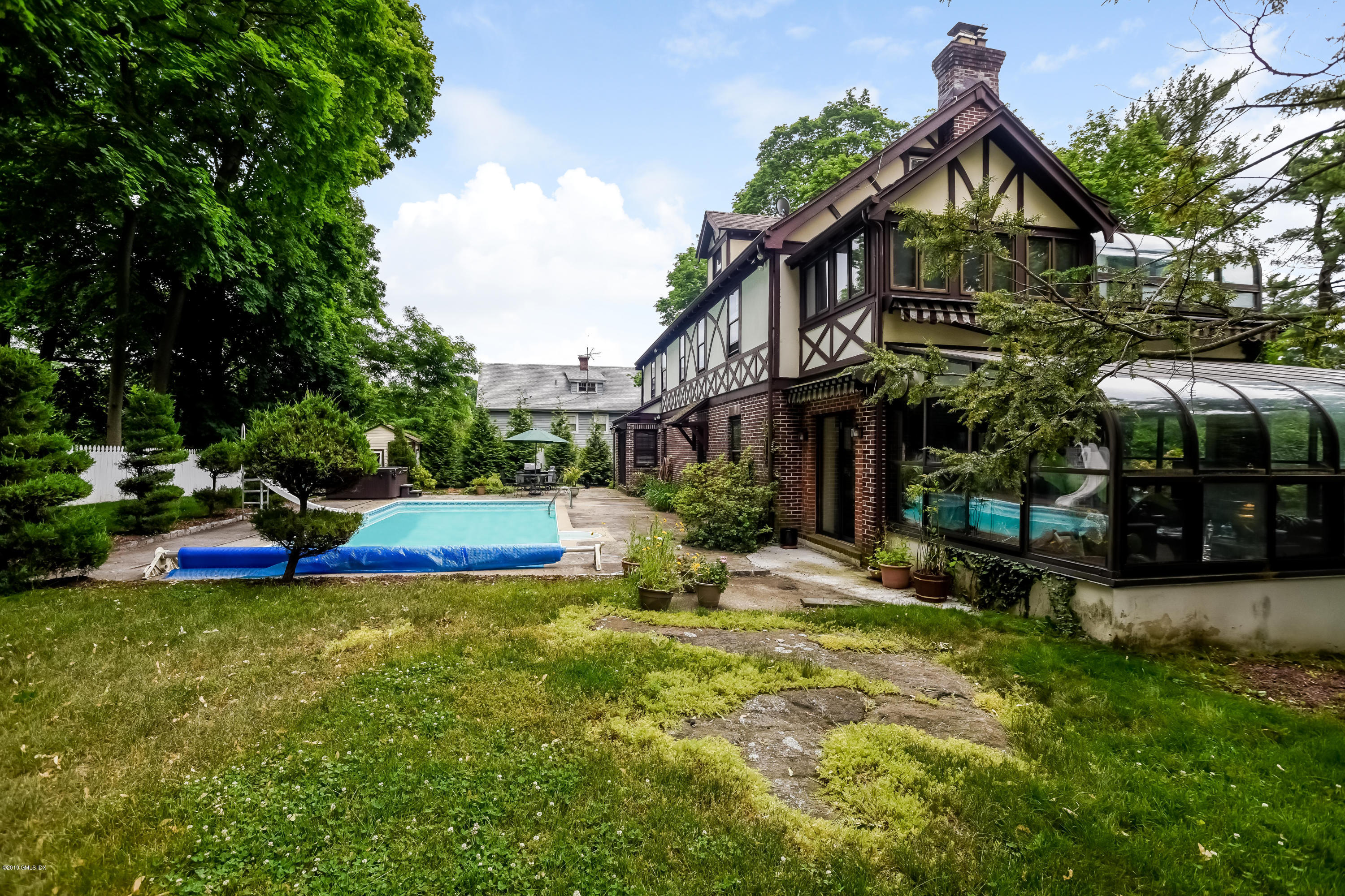 12 Old Post Road Cos Cob, CT 06830 - Photo 2 of 34 a view of house with yard outdoor seating and entertaining space