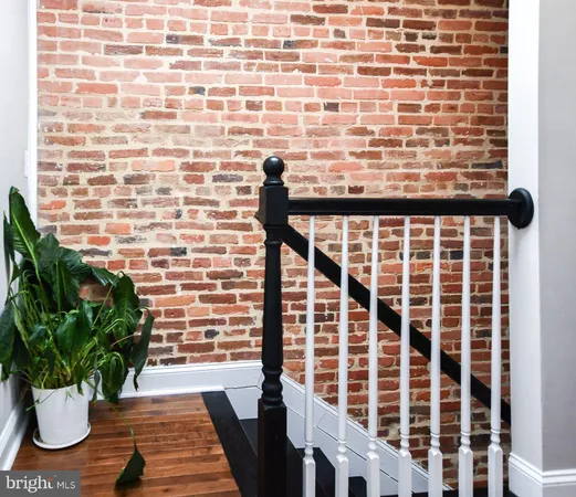 a view of hallway with livingroom and couch
