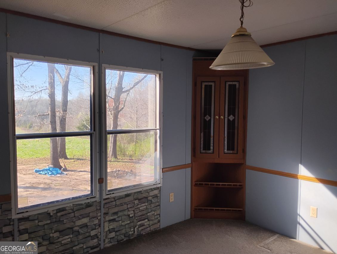 2331 Kesler Road Carnesville, GA 30521 - Photo 28 of 50 a view of an empty room with a window