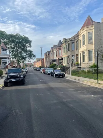 a car parked in front of a building
