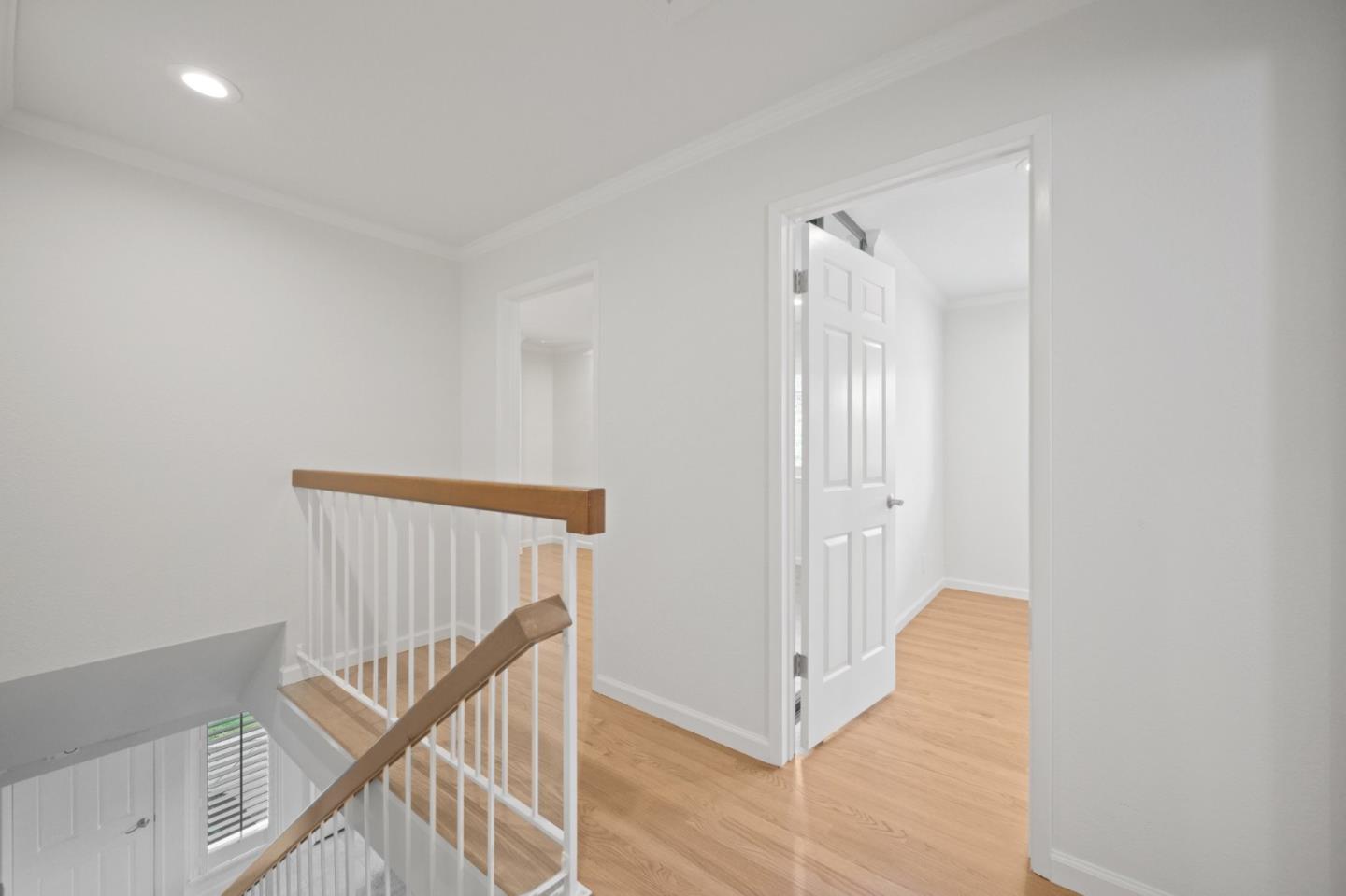 446 Hogarth Terrace Sunnyvale, CA 94087 - Photo 17 of 36 a view of a hallway with staircase