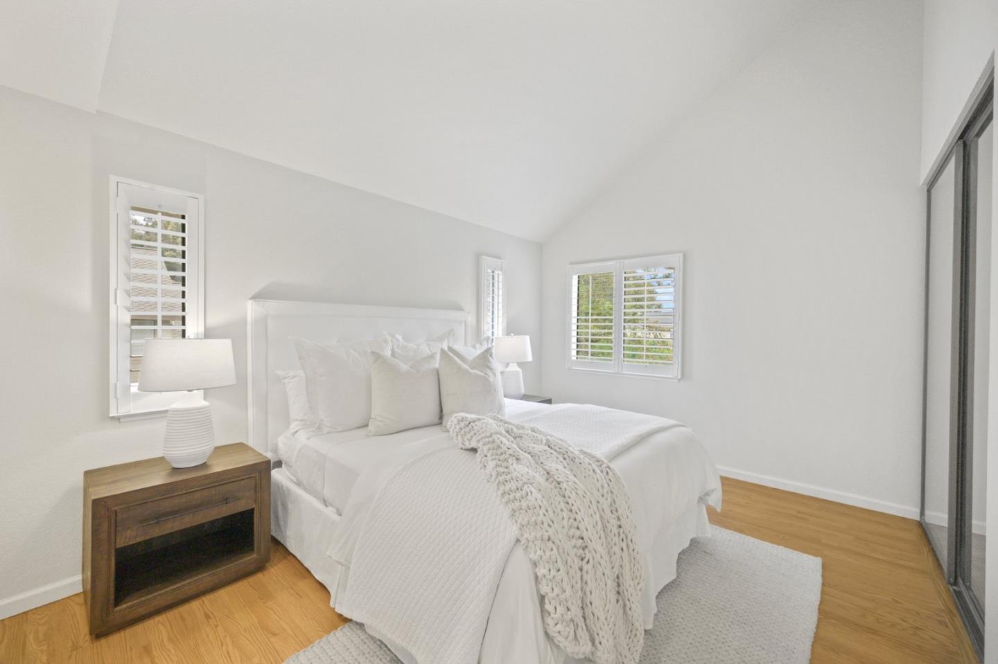 446 Hogarth Terrace Sunnyvale, CA 94087 - Photo 21 of 36 a bed room with a bed and a couch