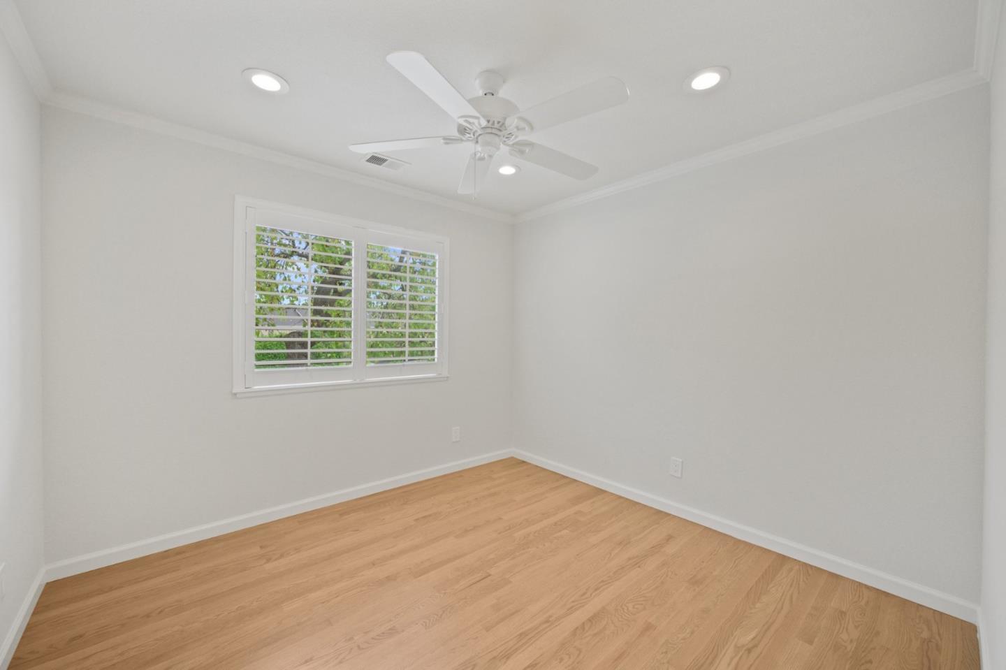 446 Hogarth Terrace Sunnyvale, CA 94087 - Photo 30 of 36 wooden floor in an empty room with a window