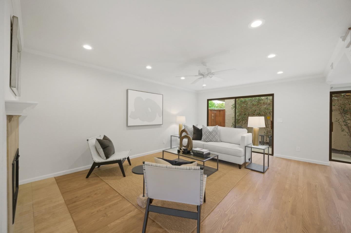 446 Hogarth Terrace Sunnyvale, CA 94087 - Photo 7 of 36 a living room with furniture and a wooden floor