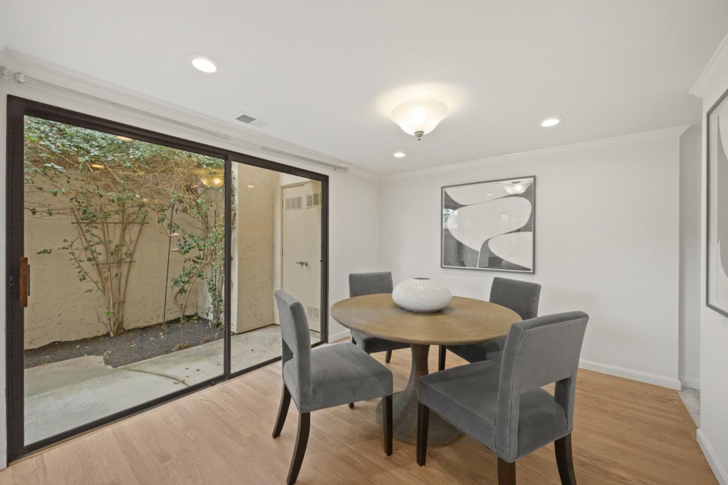 446 Hogarth Terrace Sunnyvale, CA 94087 - Photo 10 of 36 a view of a dining room with furniture and wooden floor