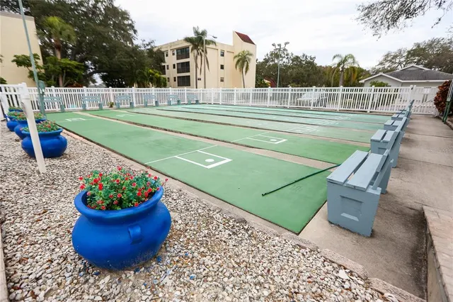 a view of a swimming pool with a lake view