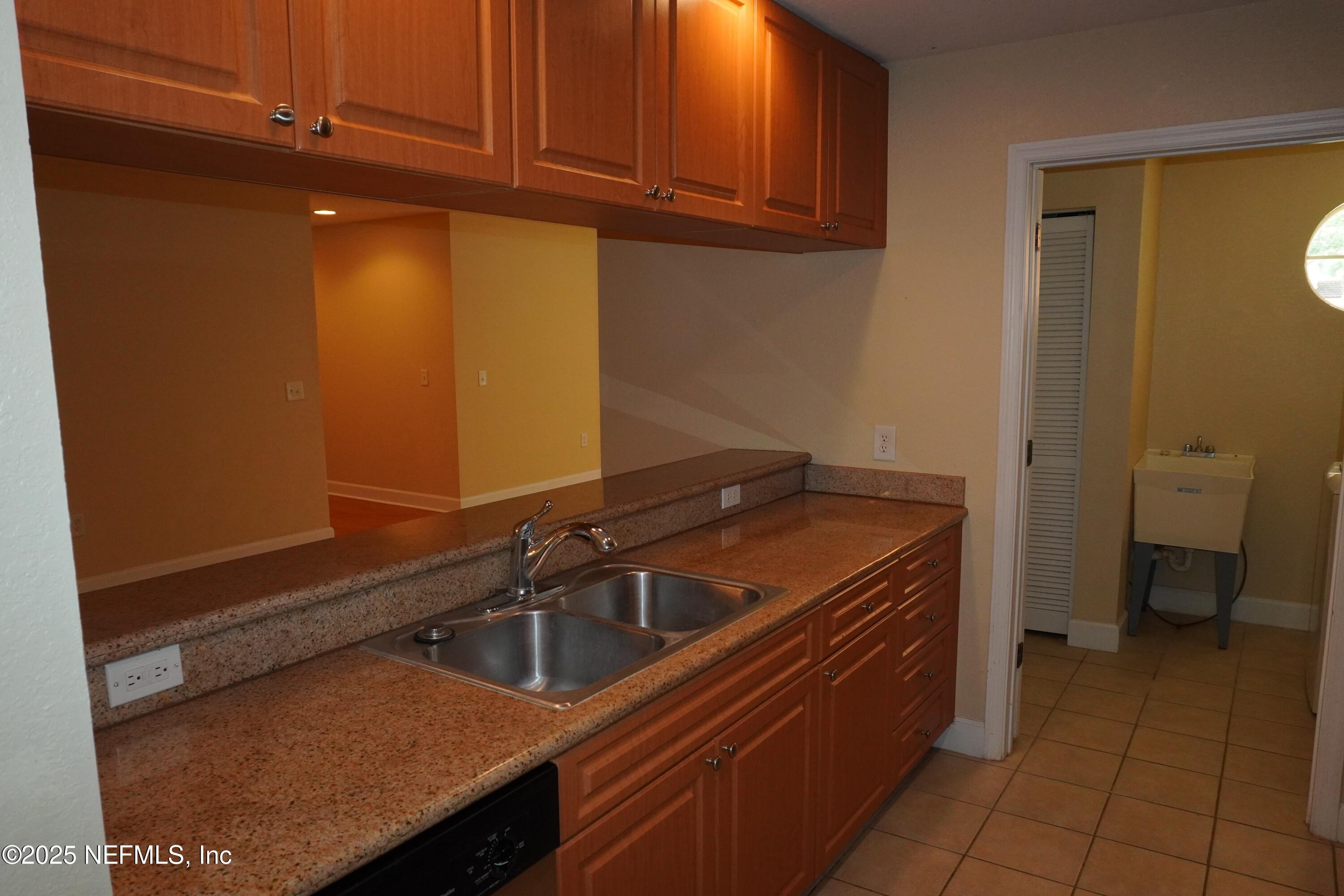 9745 Touchton Road, Unit 2201 Jacksonville, FL 32246 - Photo 11 of 32 a room with storage and utility