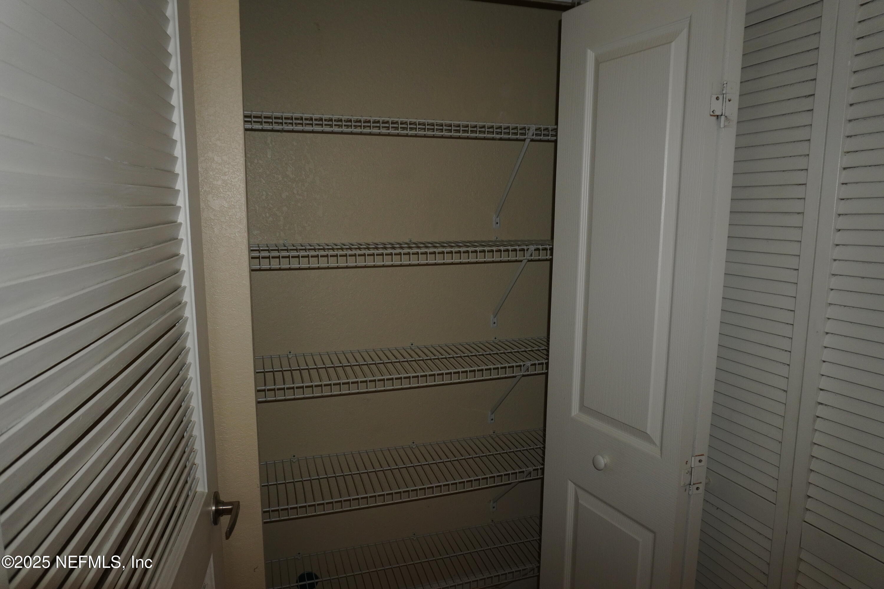 9745 Touchton Road, Unit 2201 Jacksonville, FL 32246 - Photo 15 of 32 a bathroom with a glass shower door