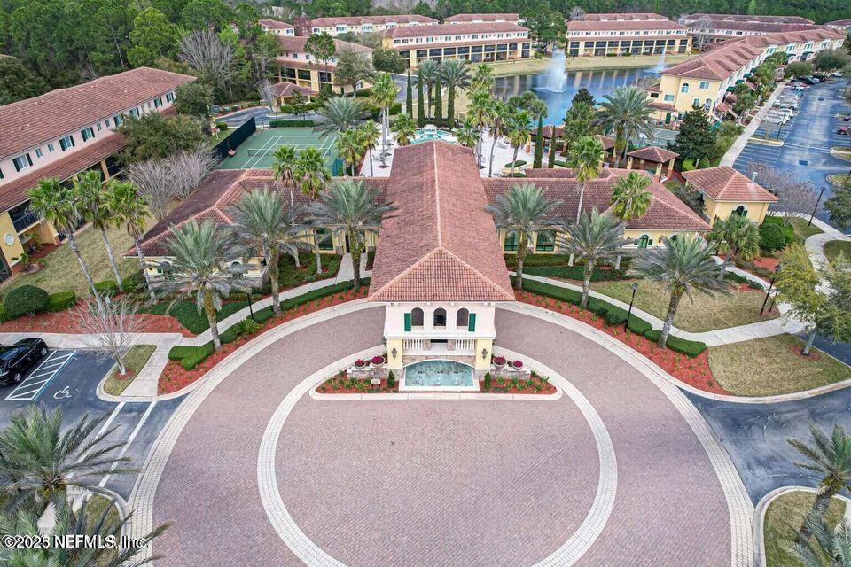9745 Touchton Road, Unit 2201 Jacksonville, FL 32246 - Photo 27 of 32 a view of a swimming pool with a patio