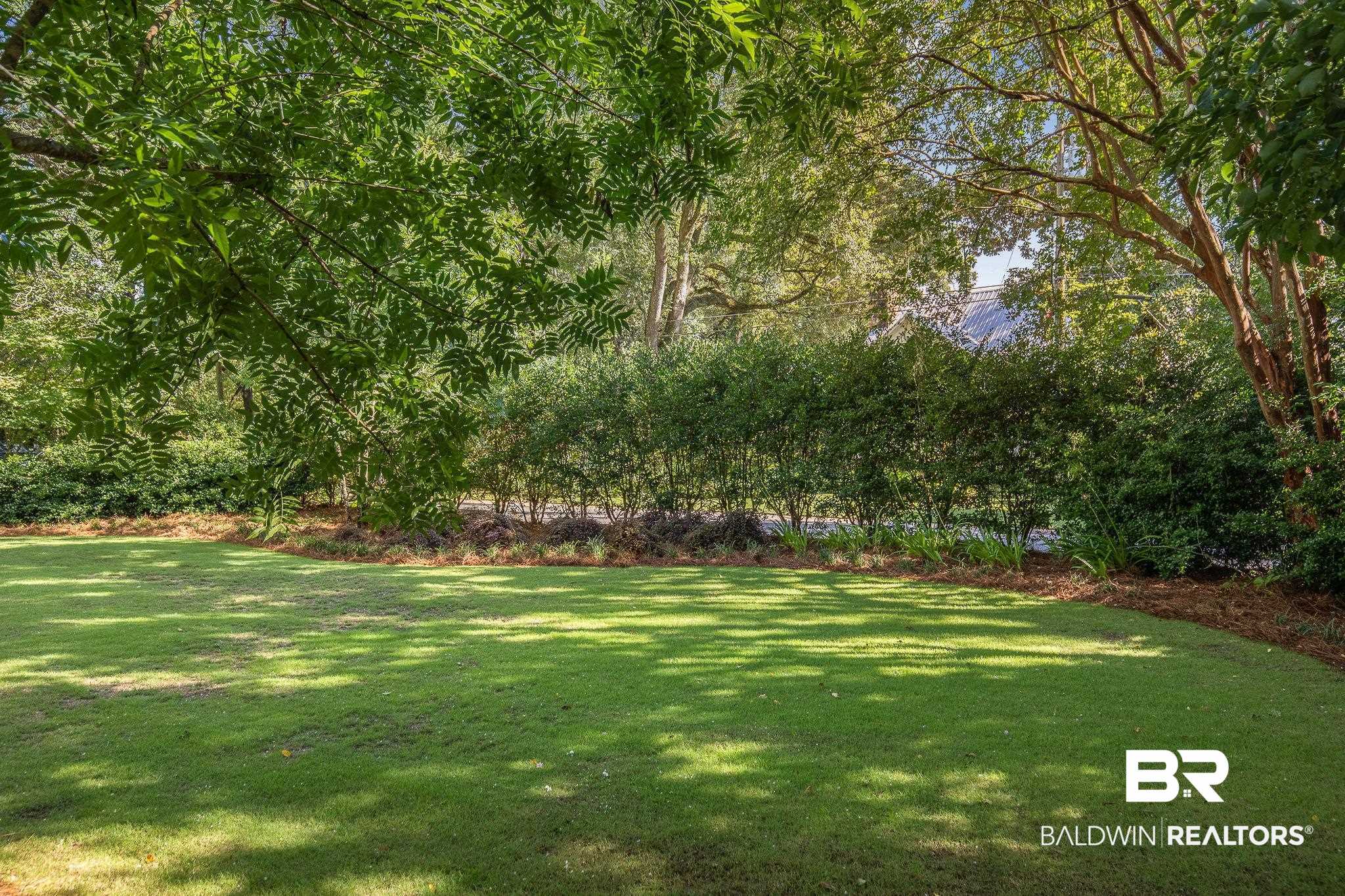 211 Pier Avenue Fairhope, AL 36532 - Photo 10 of 49 private landscaped front yard