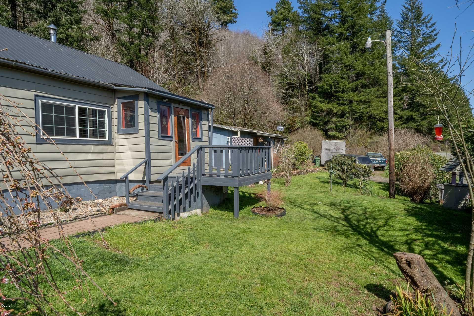 1346 Hidden Valley Road Newport, OR 97365 - Photo 6 of 23 Front door with enclosed porch
